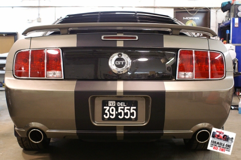 Custom designed and cut-out vinyl racing stripes installed on a Ford Mustang GT