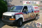 Custom designed, printed, and laminated partial vinyl wrap installed